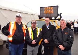 Local 115 President Wayne Mills, Brother Brett Chapman, B.C. Transport Minister Todd Stone and Local 115 Business Manager Brian Cochrane at the official opening of Highway 17, the South Fraser Perimeter Road.